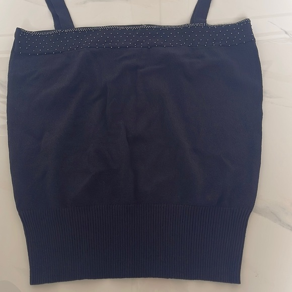 Espirit XL from HK fits as a medium US size. 68% rayon and 32% nylon - Picture 3 of 6